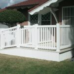 Tan-Vinyl-Porch-With-Ramp-White-Picket-Railing-500x640