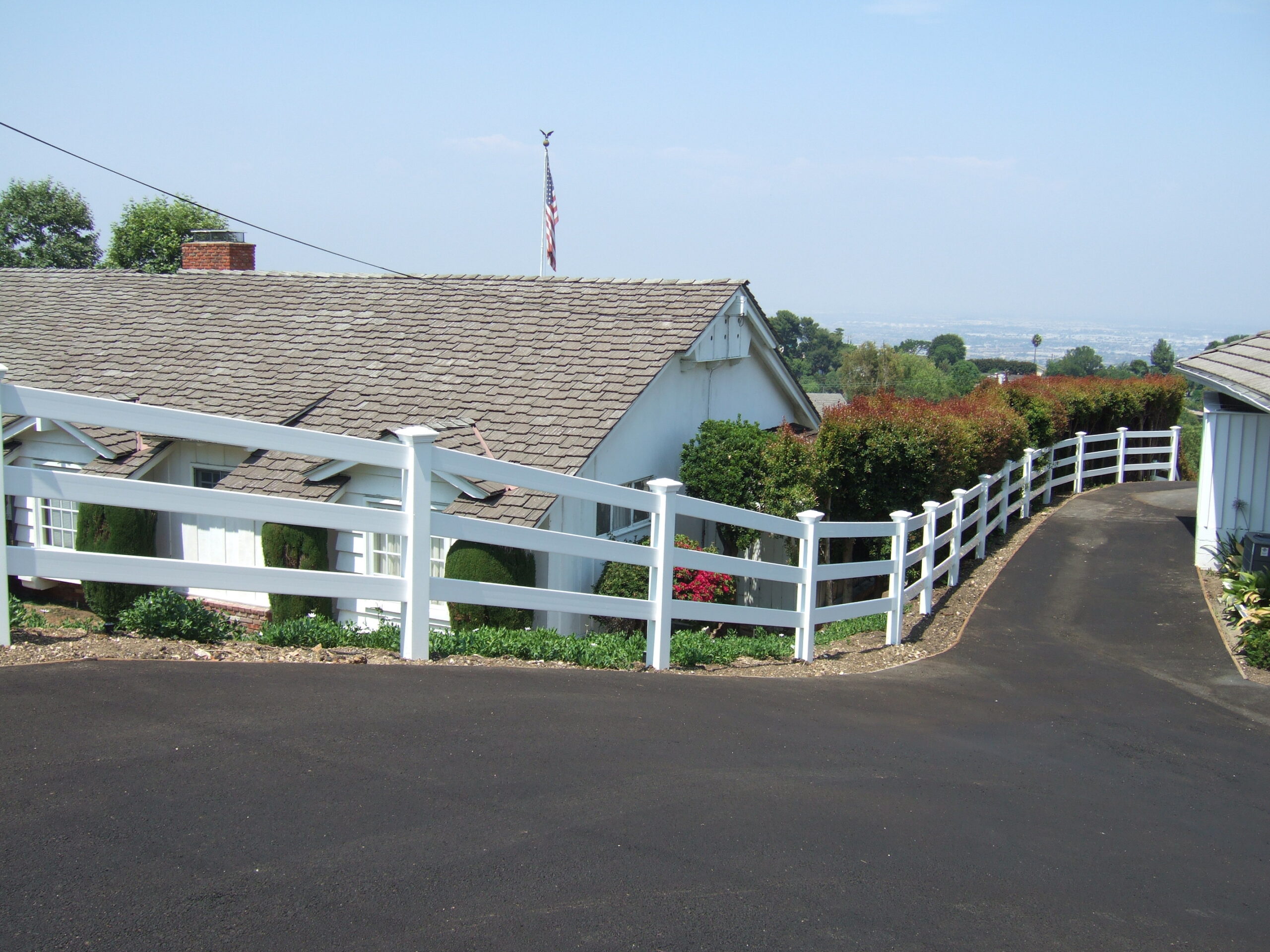 Three-Rail-Ranch-Style-Fence-Drive-Way