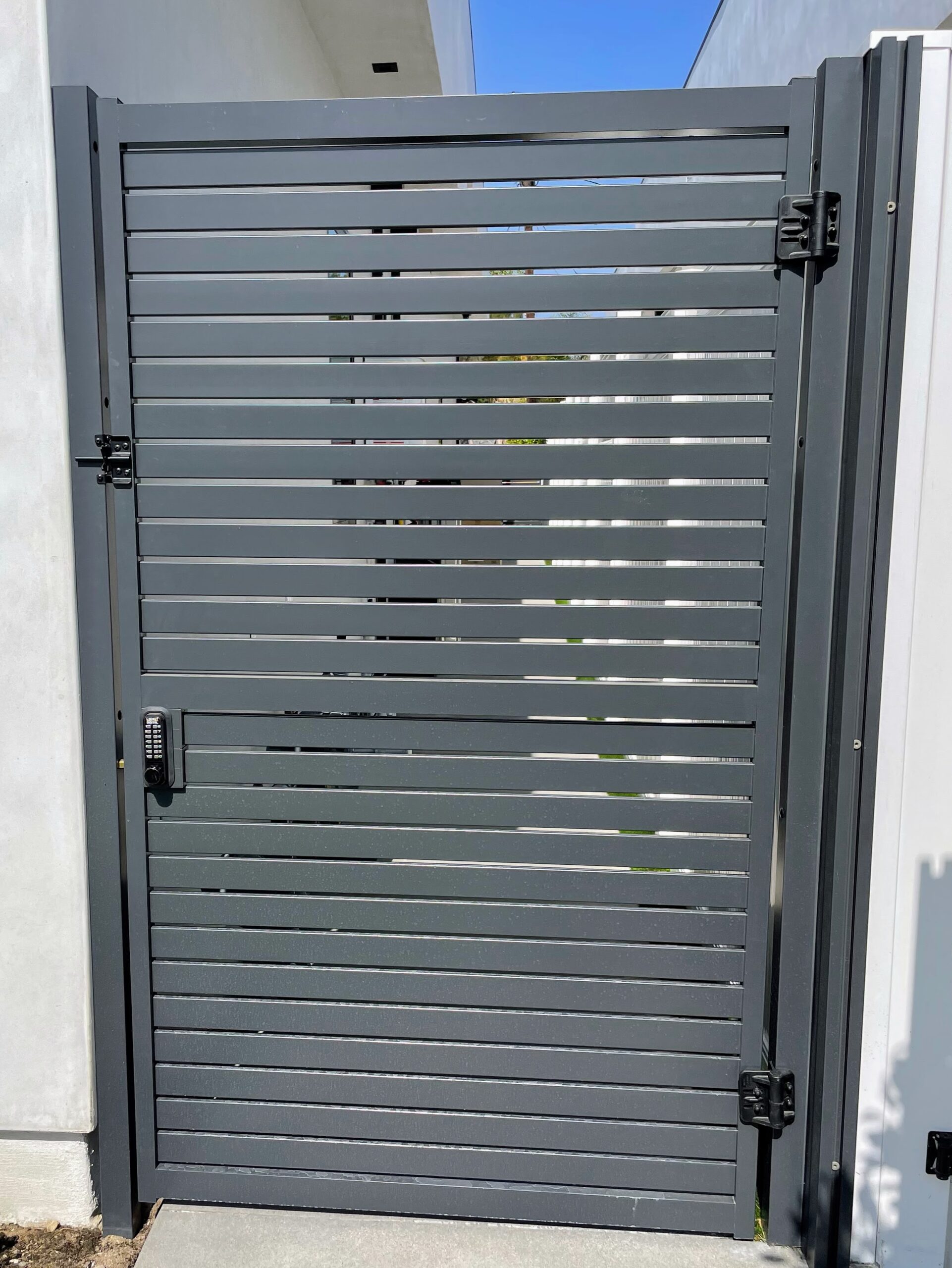 Dark Gray Aluminum side gate with security code entry