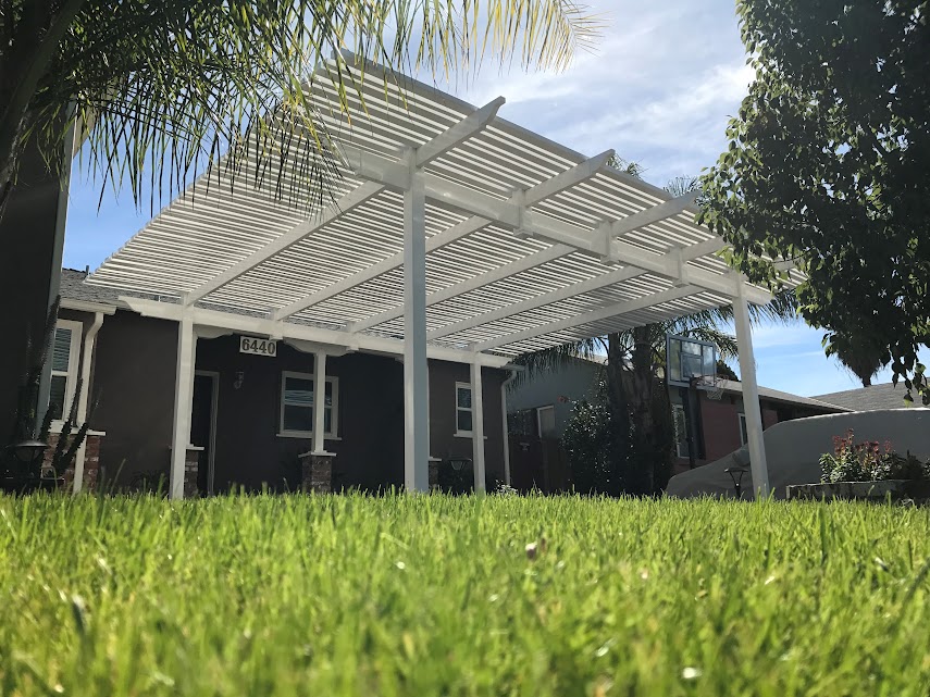 Backyard white patio cover